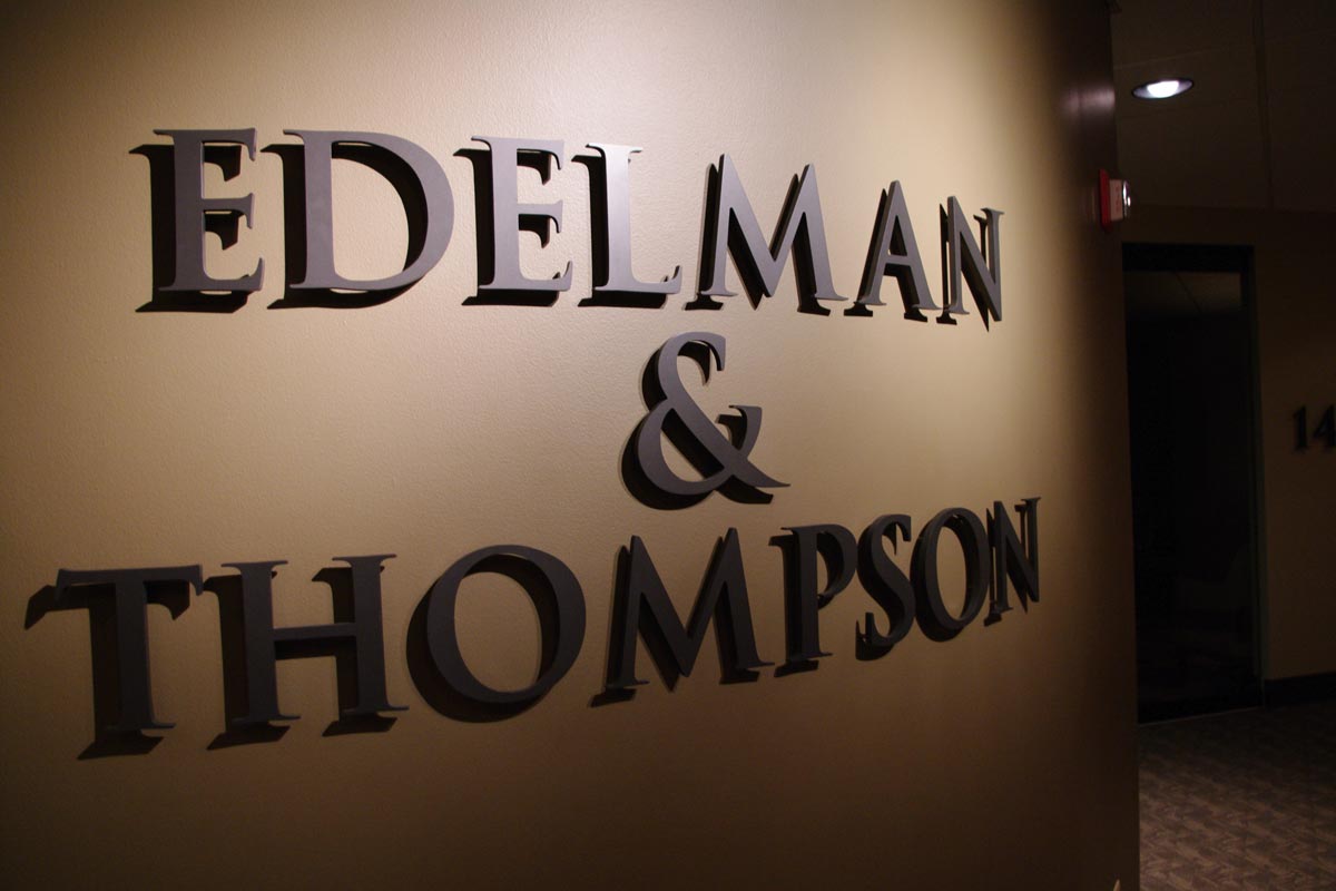 Edelman & Thompson Sign Image 1